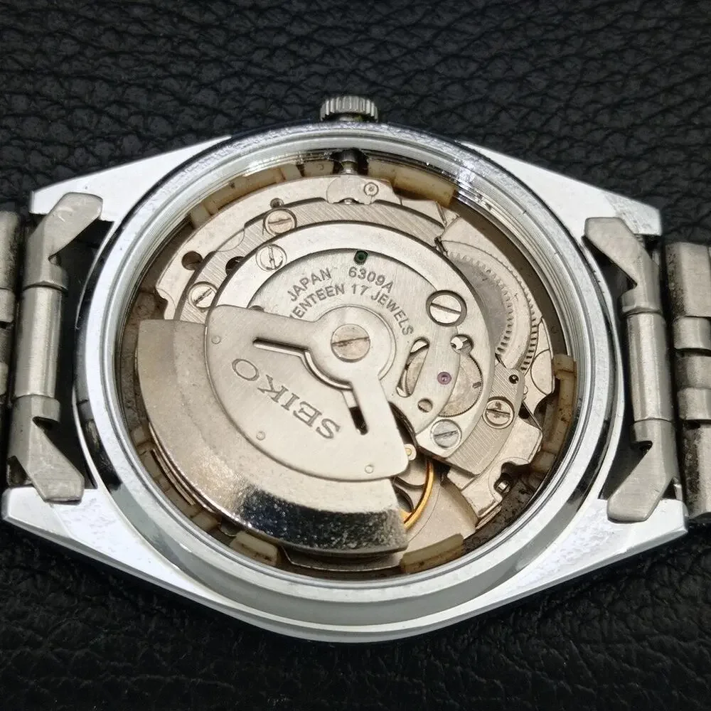 Vintage 1974 Seiko Automatic Mens Silver Watch W/daydate & Silver Accents